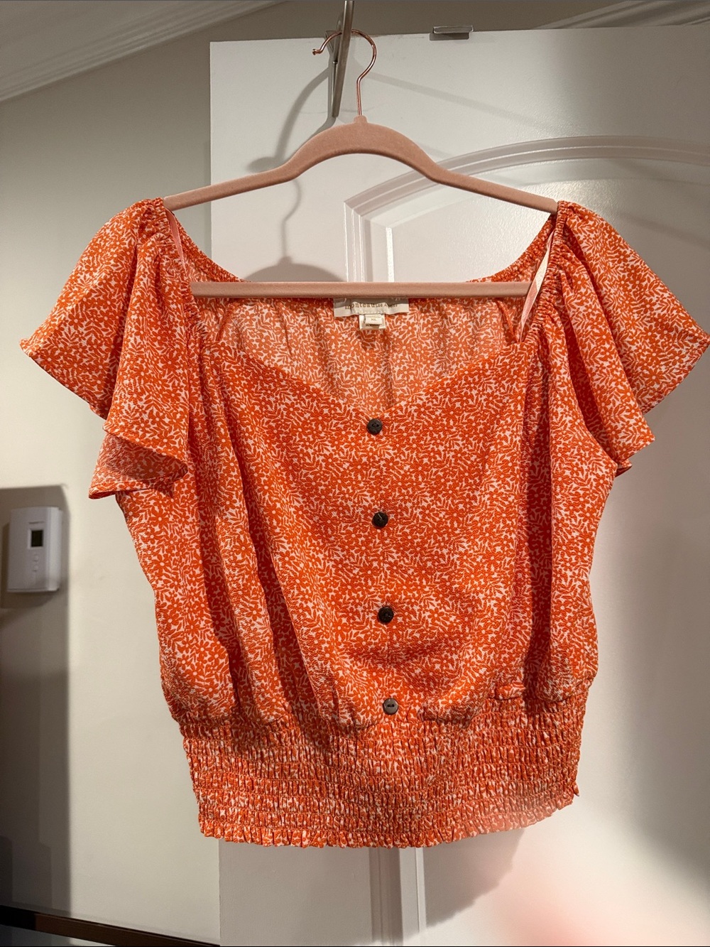 Flutter-Sleeve Orange Printed Crop Top with Smocked Hem